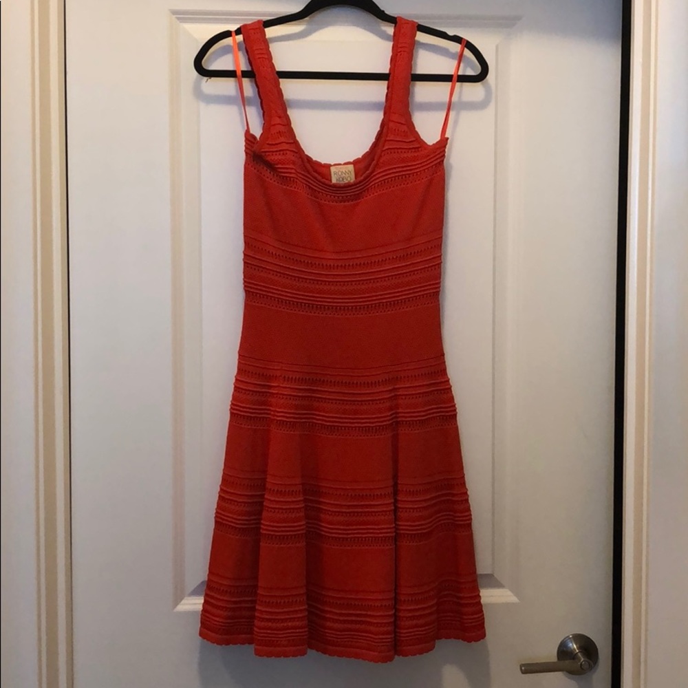 Bright orange mini dress by Ronny Kobo